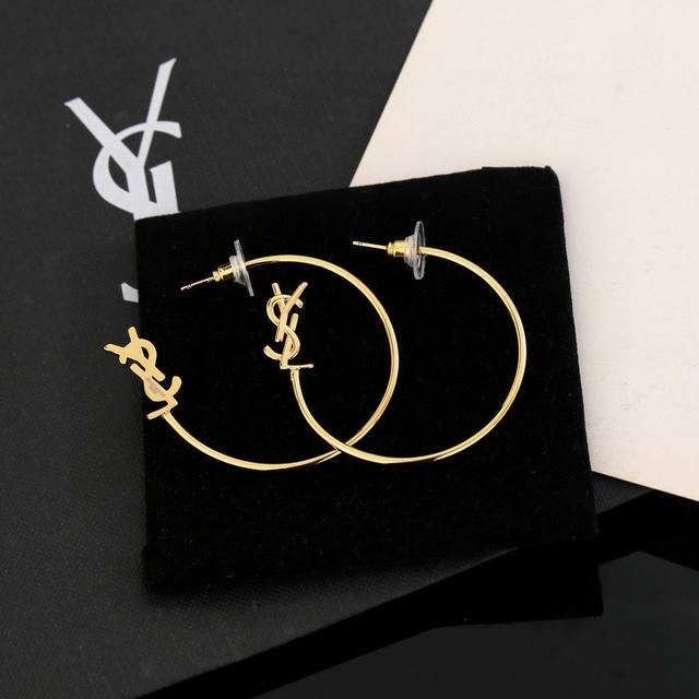 70 YSL Saint Laurent Earrings, original brass material. Yves Saint Laurent, foun
