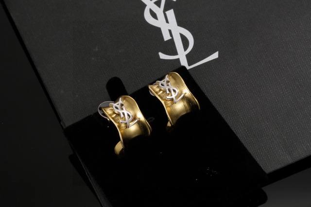 70 YSL Saint Laurent earrings, original brass material. Yves Saint Laurent, foun