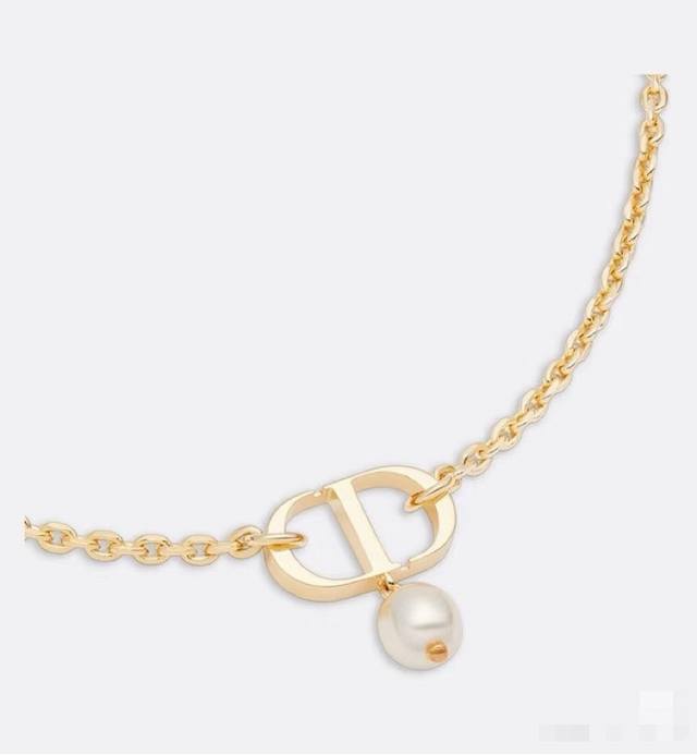 70 Dior CD Necklace: The simple CD design is undeniably stylish. The elegant pea