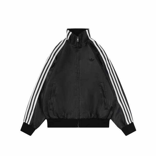 340 85-5 Adidas Originals Leather Jacket - Black. This jacket blends classic spo
