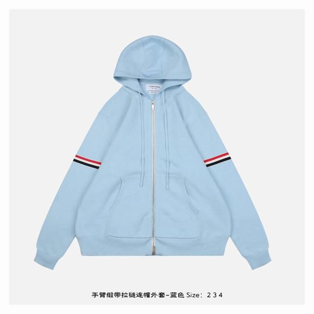 420 85-5.Ewthom Browne 25Fw This blue hooded jacket with a ribbon zipper and arm