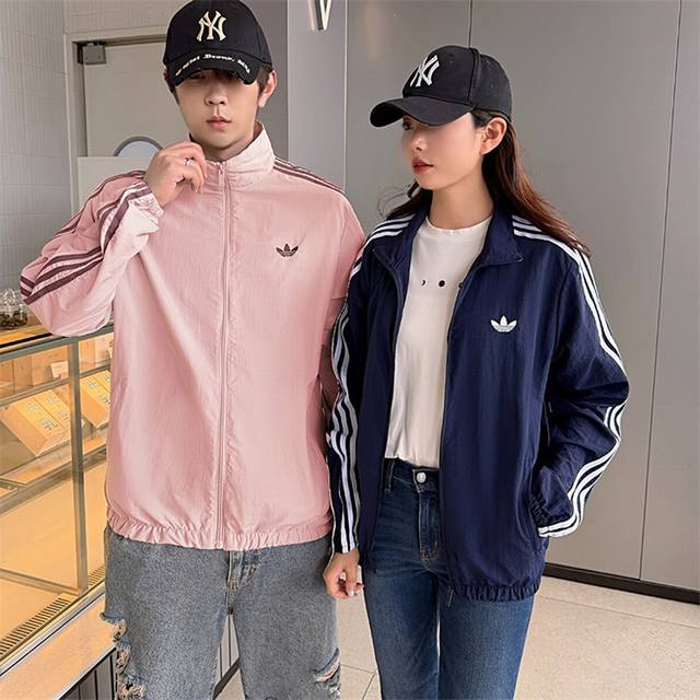 p100 品牌 : 阿迪达斯 款号 : 皮薄 尺码 : S-2Xl 颜色 : 藏青色，白色，粉色，绿色， 面料 : 尼龙，绣标，