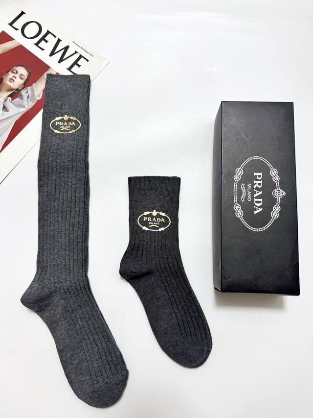 60 Two pairs of Prada classic logo knee-high and ankle socks per box, double-nee