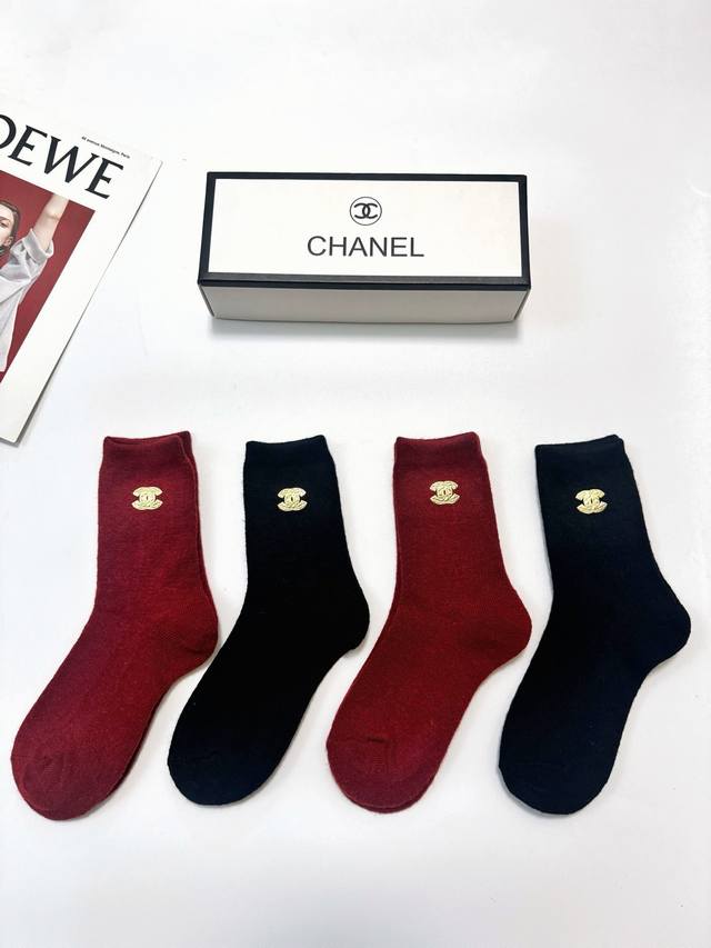 70 A box of 4 pairs of Chanel classic logo wool mid-calf socks with packaging! S