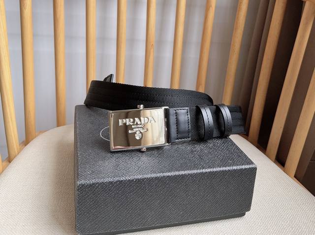 190 -- Prada's latest cotton webbing belt from the boutique. This versatile, spo
