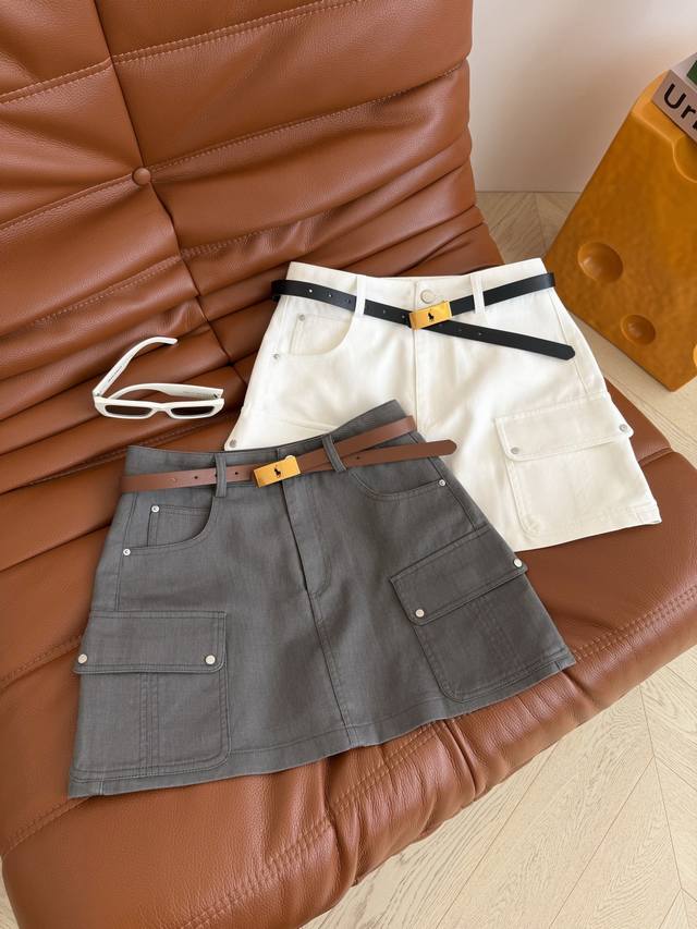 Trendy workwear style, new 2026 style, pony belt embellished workwear skirt. Per Trendy workwear style, new 2026 style, pony belt embellished workwear skirt. Per