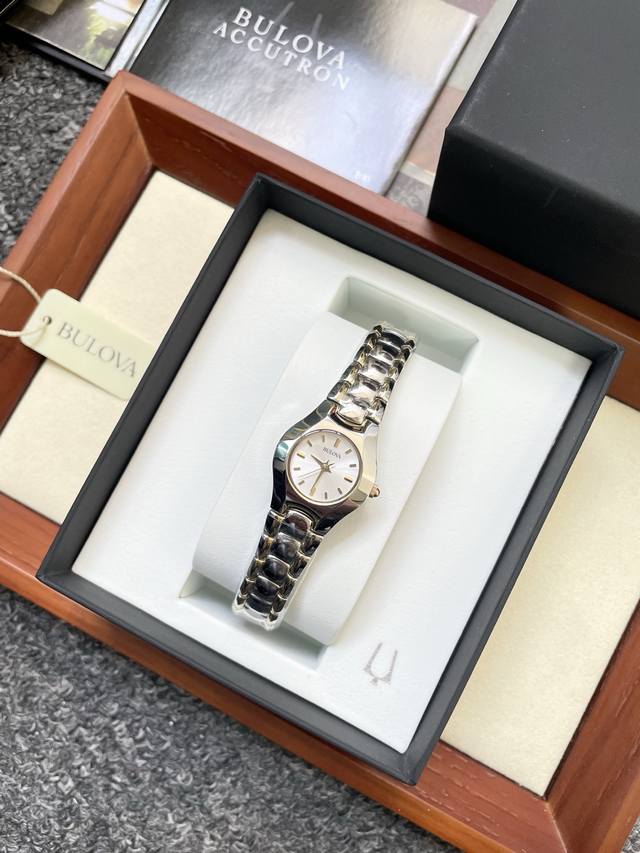 p590 Bulova Gold-Tone Ladies' Watch 98T84. A new Bulova timepiece. Bulova is ren