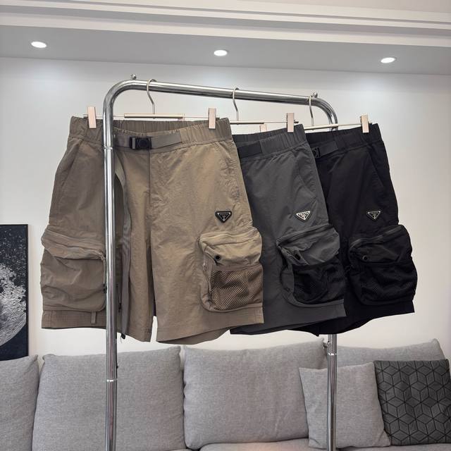 120 Prada Triangle Logo Cargo Shorts A must-have for summer trendsetters! Simple