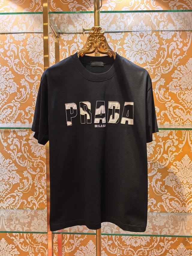 p120 Prada 2026 SS latest T-shirt with embroidered lettering and burnished flora