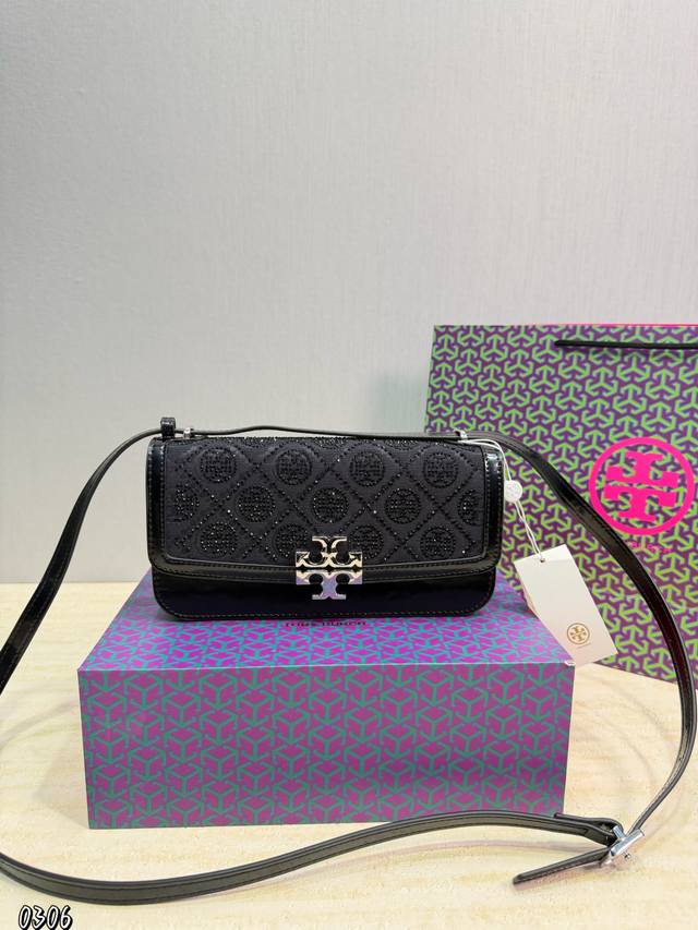 p290 Tb This new Tori bag is super hot! It can be worn on the shoulder or crossb