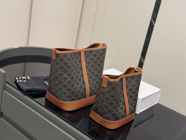 ?260 ?250 Comes with folding box Size: 25*27cm 18.22cm Celine Bucket Bag Who can