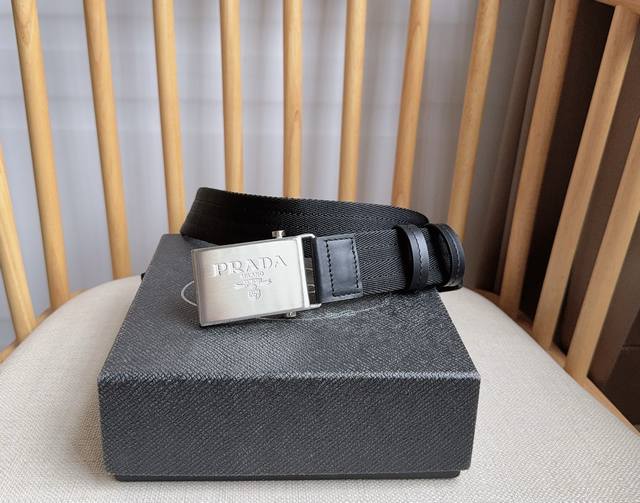 p340 Prada, the latest model from Prada boutiques, this cotton webbing belt feat p340 Prada, the latest model from Prada boutiques, this cotton webbing belt feat