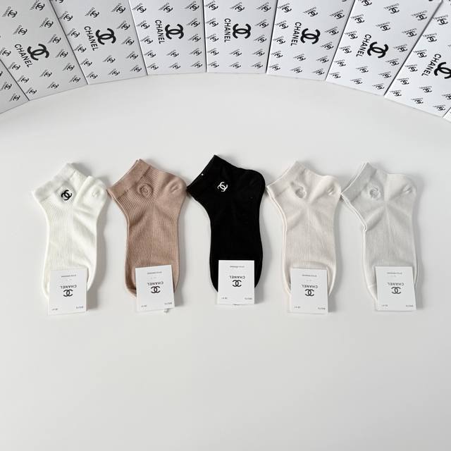 p100 Chanel's new classic embroidered mid-length slouch socks! Five pairs per bo