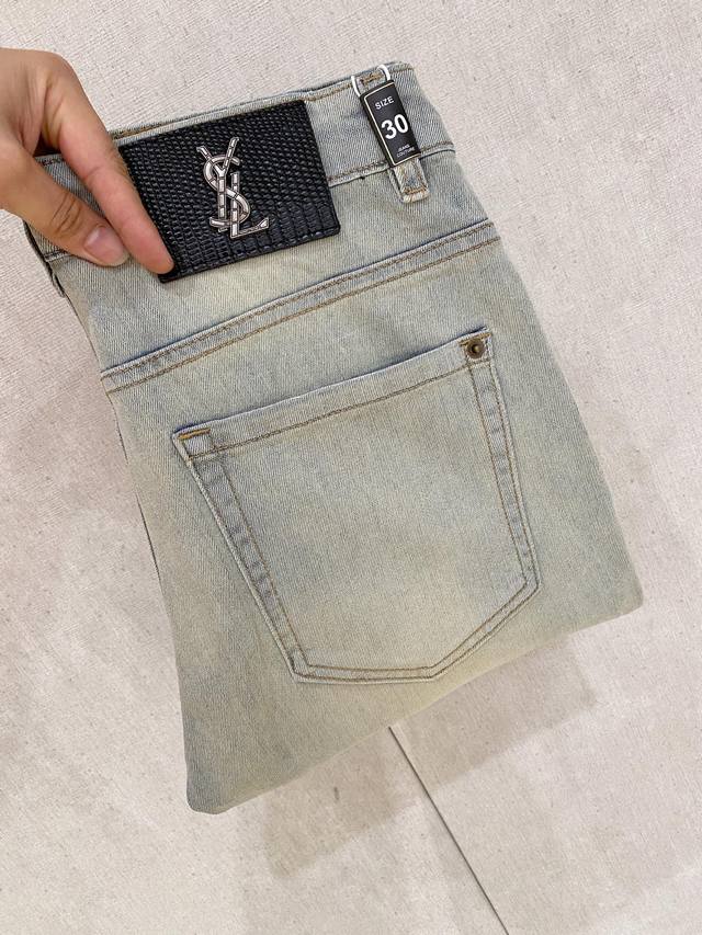 p260 YSL Saint Laurent high-end custom-made jeans, distinguishing them from regu
