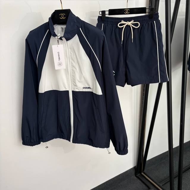 p400, style number 20265447, Chanel* new nylon suit, Chanel logo embroidered col p400, style number 20265447, Chanel* new nylon suit, Chanel logo embroidered col