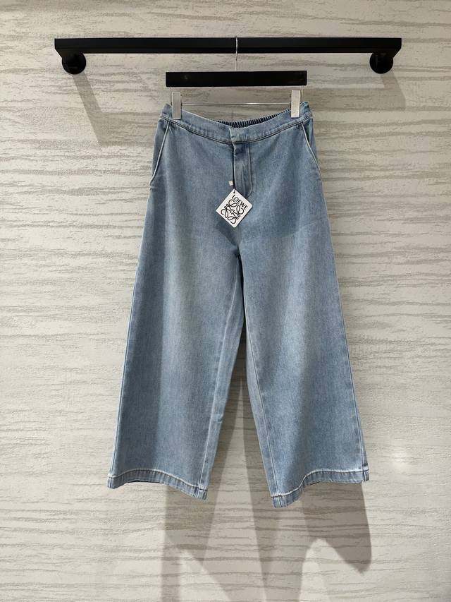 p300 Loewe light blue cropped jeans with an elasticated back waistband. The Anag