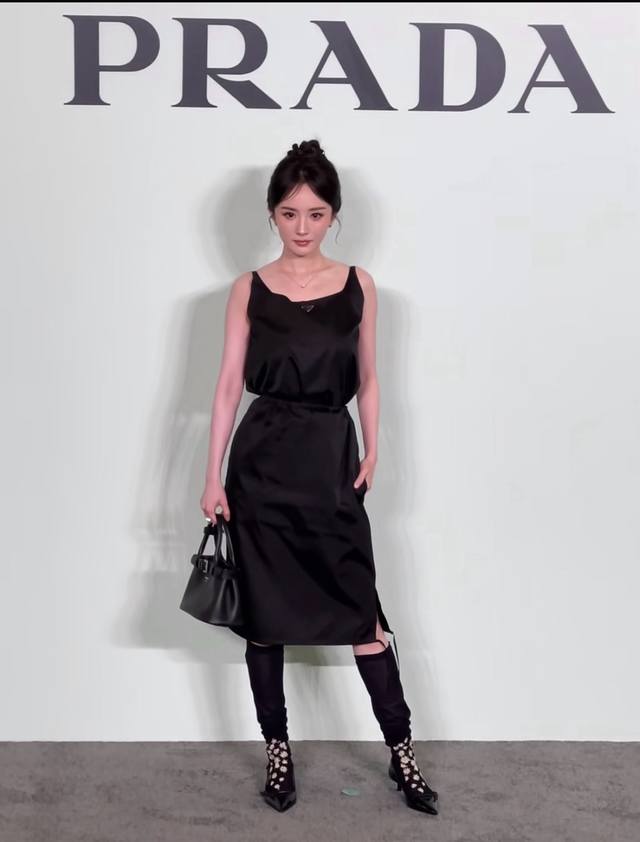 p290 50 Spring/Summer New Arrival Dress - Pra**'s iconic black satin slip dress,