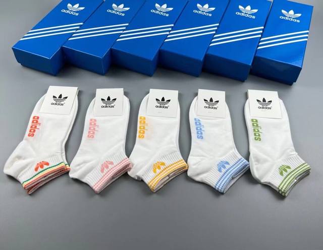 Adidas new women's white socks, featuring the wildly popular trefoil logo design