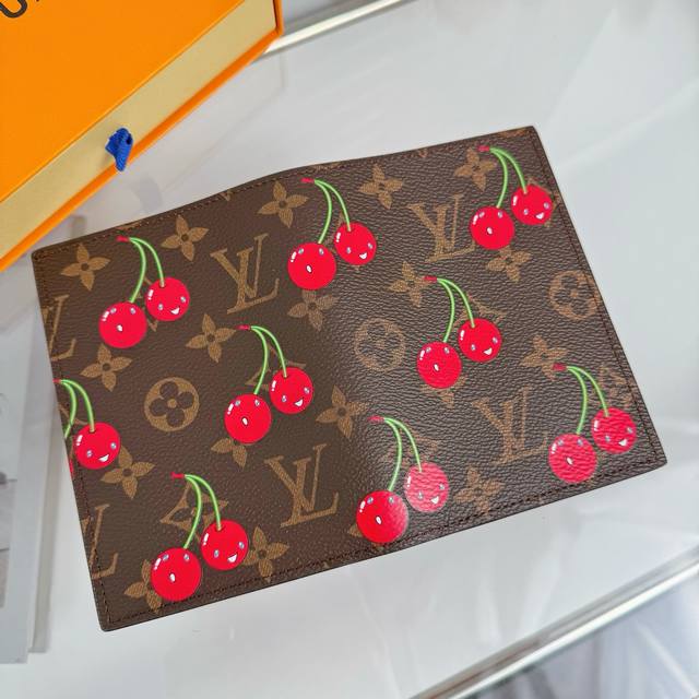 120 New Arrival Lv Cherry Passport Holder This passport holder is crafted from D