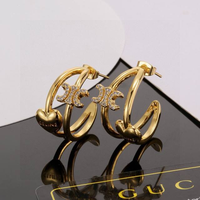 p70 Celine earrings, classic gold, small, delicate, cute, and versatile. The ret