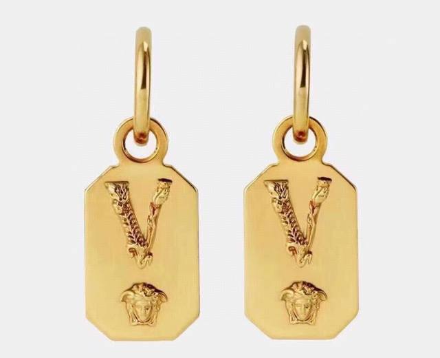 p70 Versace earrings. Their unique design and distinctive personality will overt