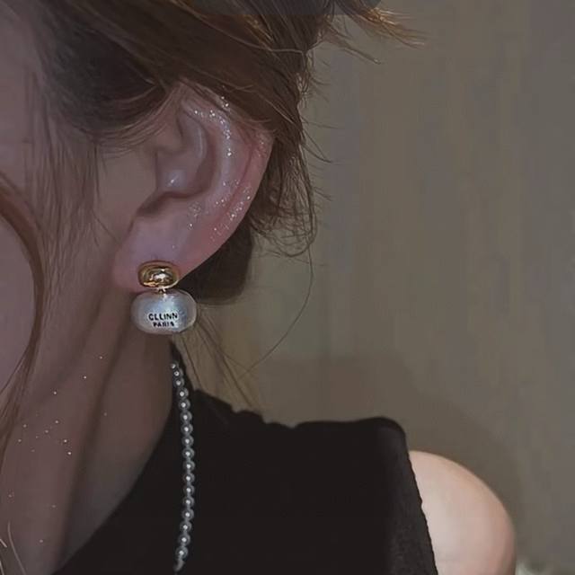 p70 This Celine Arc de Triomphe brushed metal stud earring is a hot seller. Celi