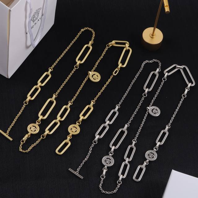 Versace necklace, ?100 ( ); Versace long necklace ( ); Versace sweater chain ( )