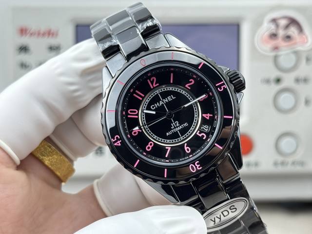 2080Yyds J12 Blush series watch features pink and red hour markers and bezel ind