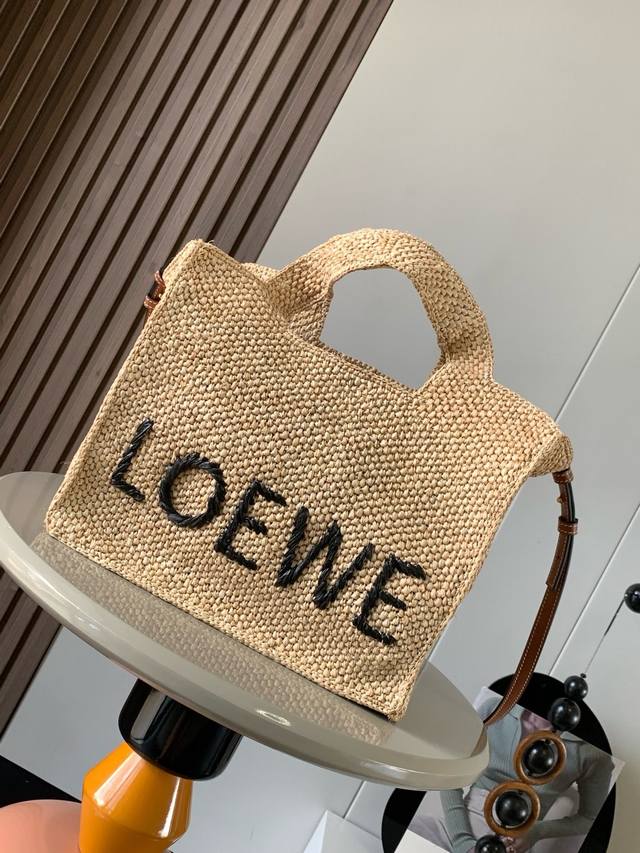 p1070 Medium Raffia Loewe Font Tote Handbag. The Loewe Font Tote is a rectangula