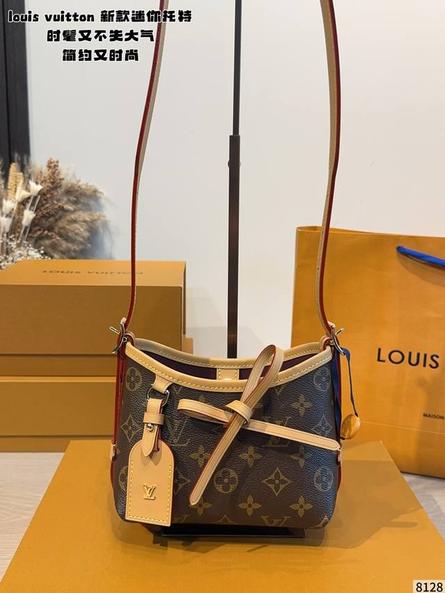 p290 Nano Carryall New Cute Little Bag Who can resist a little bag with a bow? N