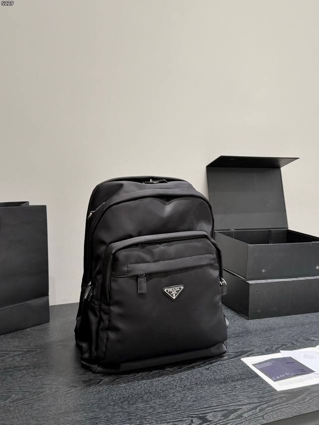 p170 Prada Nylon Backpack. Made of recycled nylon, it's lightweight, durable, an p170 Prada Nylon Backpack. Made of recycled nylon, it's lightweight, durable, an