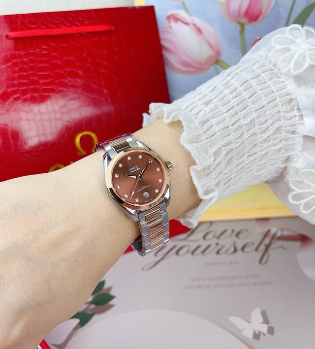 390 is a stylish quartz women's Omega Seamaster Aqua Terra Shades watch, 34mm in